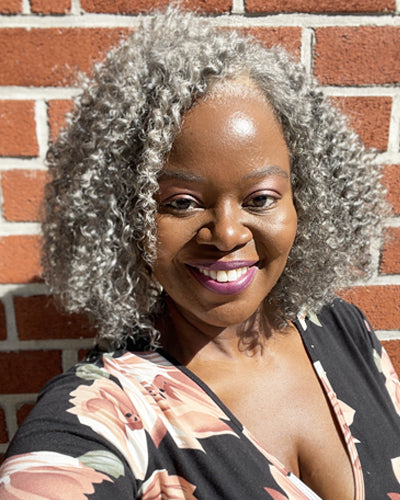 Soul Lady Wigs salt and pepper Jerry curly lace wig, showing natural gray-white blend and tight, defined curls.