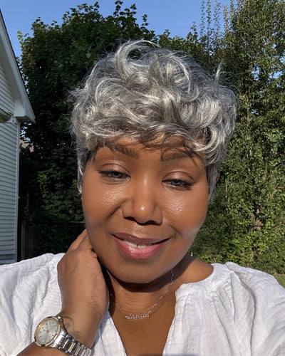 Soul Lady Wigs salt and pepper natural wave pixie cut wig, showing soft gray-white blend and gentle wavy texture.