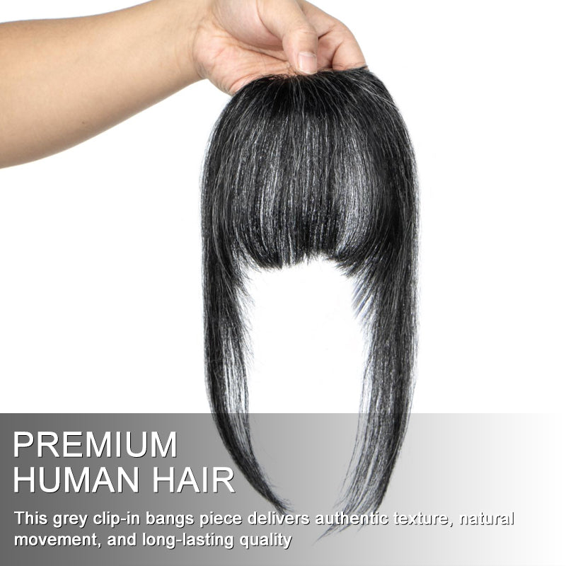 Soul Lady Wigs dark salt and pepper clip-in full bangs hairpiece with long face-framing sides, held by hand on a white background to show color tone and detailed craftsmanship.